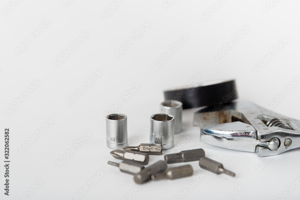 adjustable spanner and other tools on a white background adjustable spanner and other tools on a white background