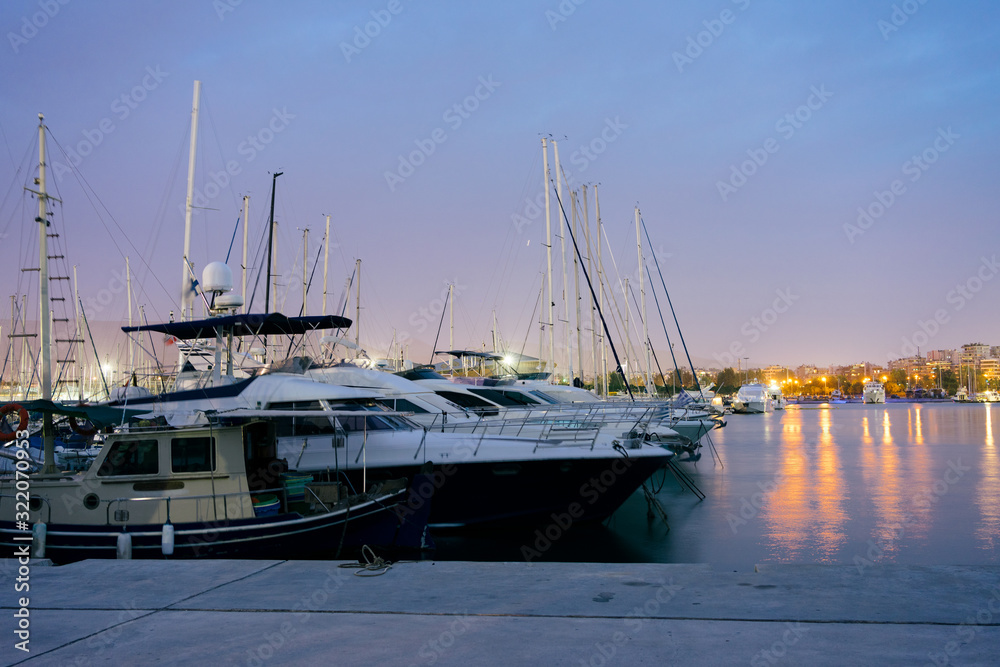 Fototapeta premium Athens, Greece - Dec 21, 2019: Marina of Flisvos in Athens at night , Athens, Greece.