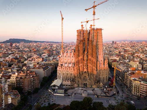 Barcelona, Spain - June 13, 2019: Aerial panorama view of Barcelona city skyline and Sagrada familia at dusk time
