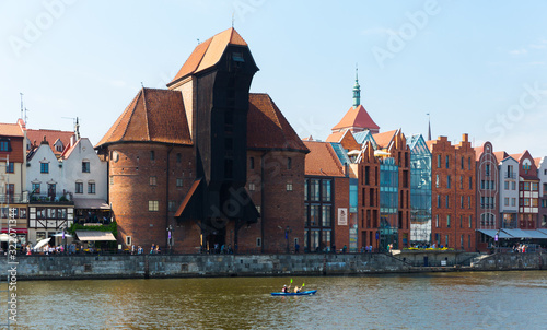 Image of embankment in historical part of Gdansk at sunny day, Poland