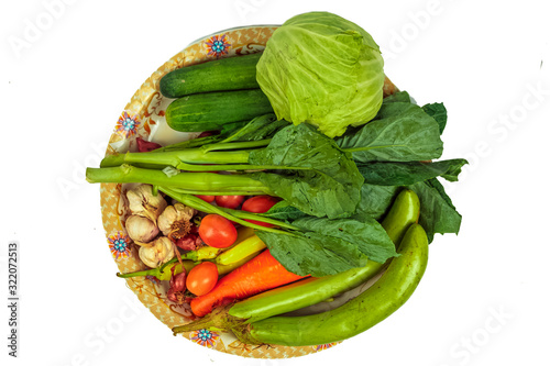 Fresh vegetables isolated on a white background with herbal medicine concept., top view