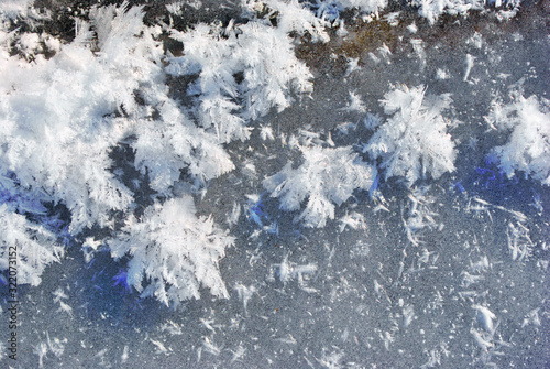  Ice surface with large fluffy snowflakes, natural organic background, top view © ArtoPhotoDesigno