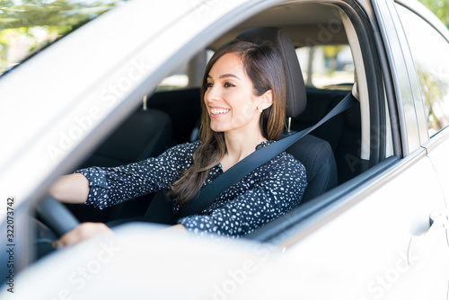 Woman Enjoying Car Ride photo