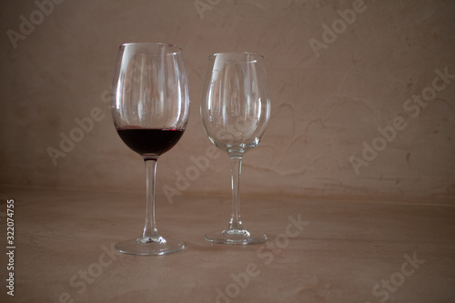 2 wine glasses, red wine