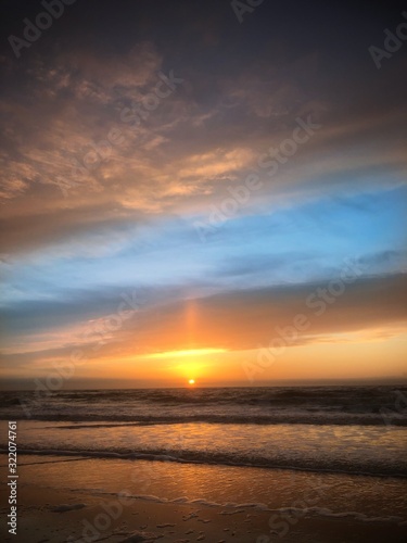 Sunset at the beach Julianadorp Netherlands. Coast Northsea. 