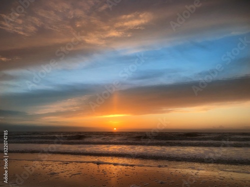 Sunset at the beach Julianadorp Netherlands. Coast Northsea. 