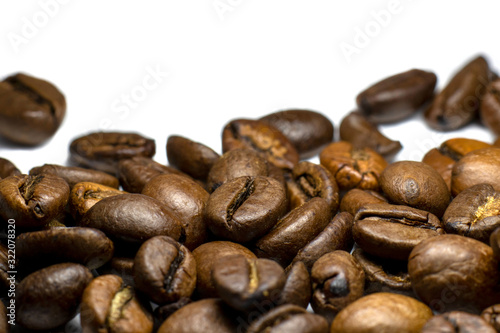 Coffee beans background  roasted coffee beans on a white background  space for text.