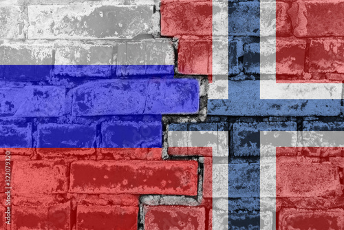 Russia Federation and Norway - National flags on Brick wall. Governments relations and conflict concept.