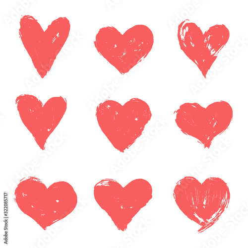 Set of pink, red hand drawn hearts. Vector grunge heart shapes.