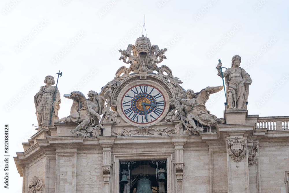 Vatican city travel sculpture around the clock tower, tourism.