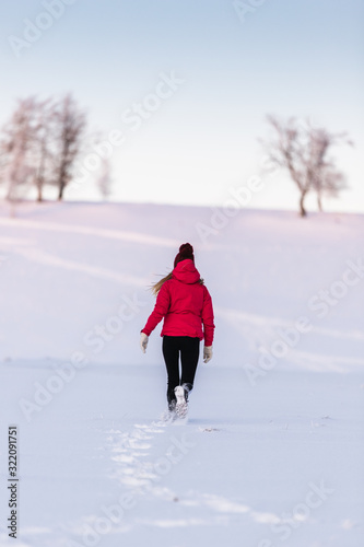 Young female running in the...