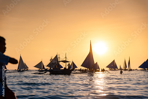 Paraw sailing at Boracay Island, Philippines at Sunset
