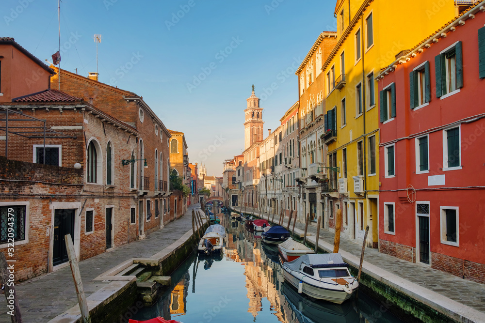 View of the canal and tower in Venice