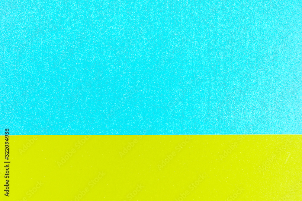 Texture of a blue and yellow paper for background.
