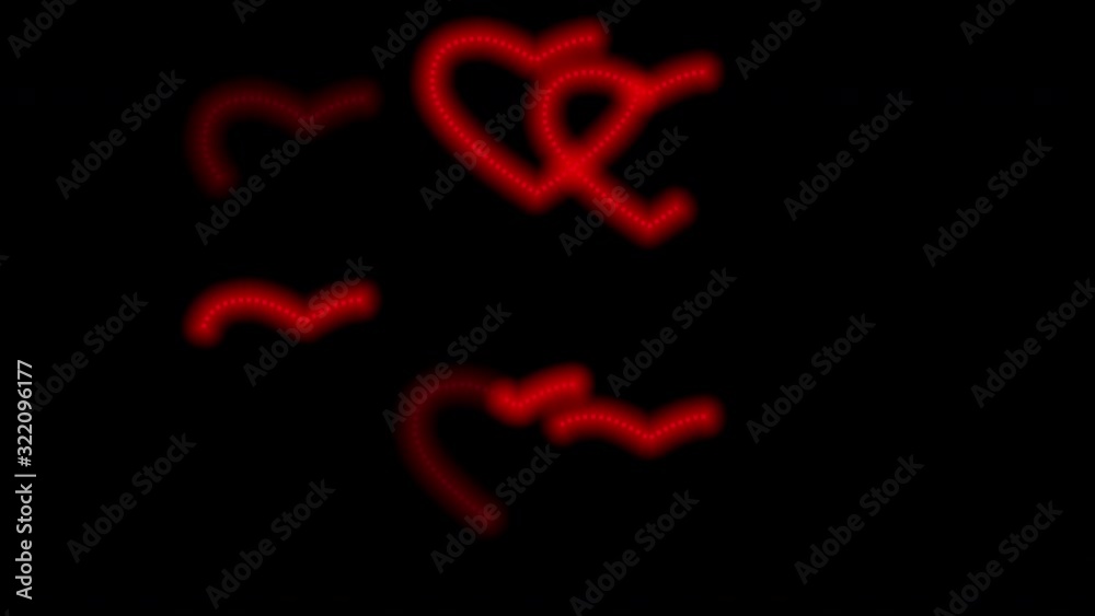 Red neon lights running in a heart shape on a black background Red neon lights running in a heart shape on a black background