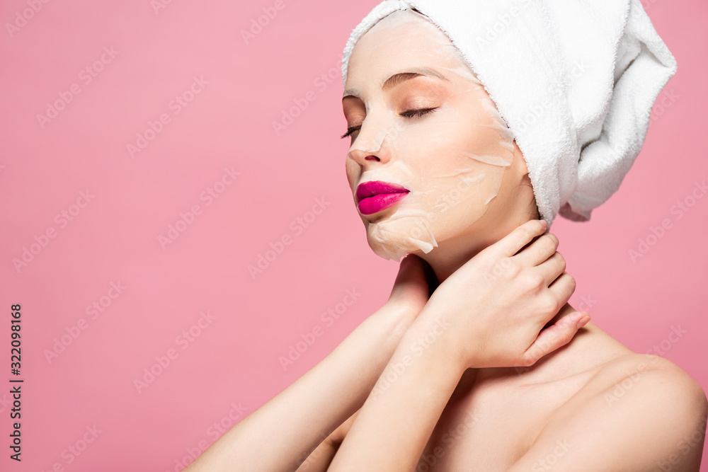 young woman in moisturizing face mask with closed eyes isolated on pink young woman in moisturizing face mask with closed eyes isolated on pink