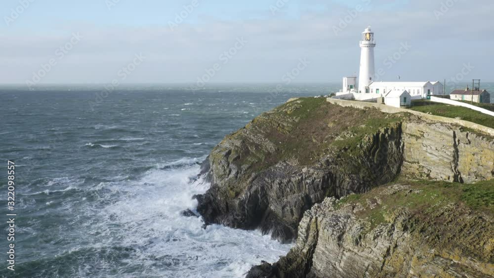 South Stack, Holyhead Lighthouse, Anglesey, Wales Slow Motion Stormy Sea Waves South Stack, Holyhead Lighthouse, Anglesey, Wales Slow Motion Stormy Sea Waves