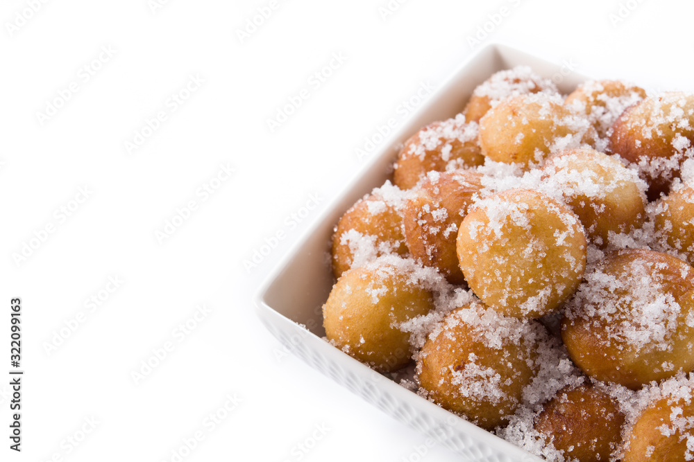 Carnival fritters or buñuelos de viento for holy week isolated on white background copy space Carnival fritters or buñuelos de viento for holy week isolated on white background copy space