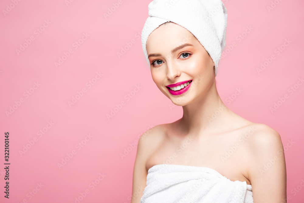 smiling woman in white towel on head isolated on pink smiling woman in white towel on head isolated on pink