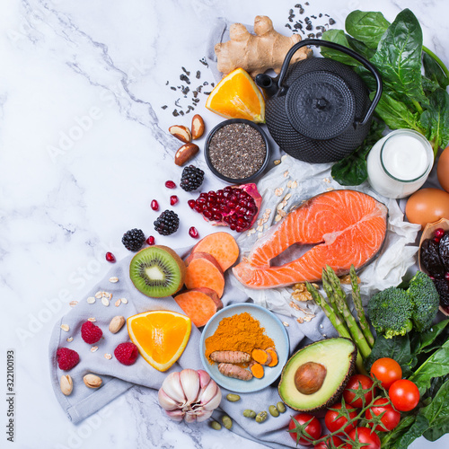 Assortment of healthy food  superfood ingredients for cooking on table