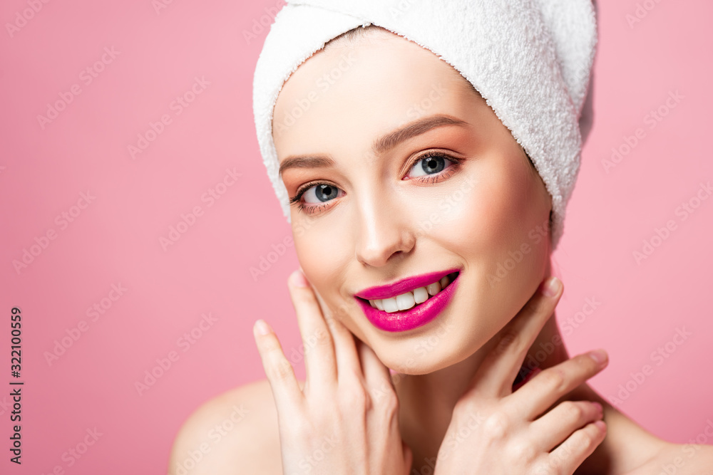 cheerful young woman in white towel smiling isolated on pink cheerful young woman in white towel smiling isolated on pink