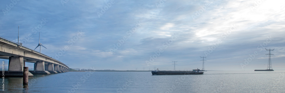 Panorama. Ketelmeer en Ketelbrug. Freightship. Barge. Riverboat. Bridge. Netherlands. Flevopolder. Zuiderzee. 