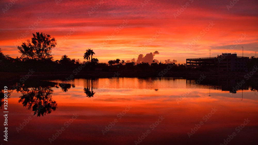 blazing sunset glow over the lake