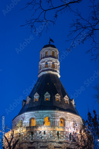 Old Simonov monastery (convent) in Moscow, Russia. The Dulo round tower at night. photo