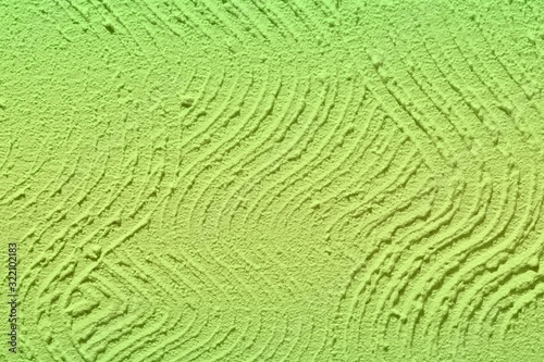 green retro waved paint on wall texture - cute abstract photo background