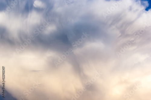 Fototapeta Naklejka Na Ścianę i Meble -  plumose clouds of the top tier in blue space of the sky