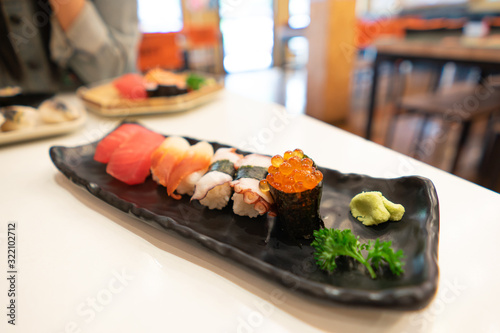 Sushi set with salmon roe, octopus, The Stimpson surf clam and tuna In a Japanese restaurant