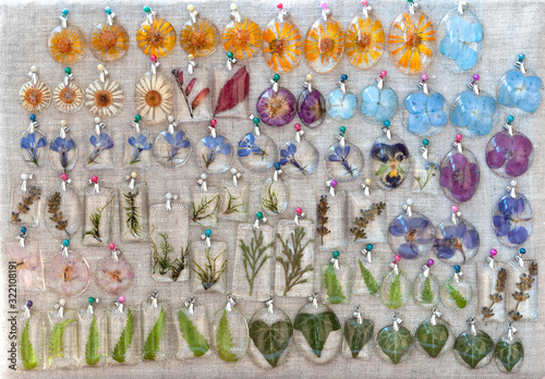 handmade epoxy resin jewelry. pendants.