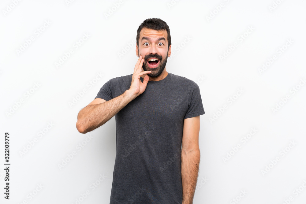 Young handsome man over isolated white background with surprise and shocked facial expression Young handsome man over isolated white background with surprise and shocked facial expression