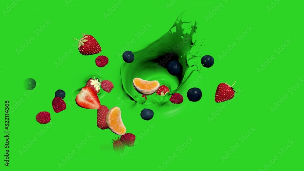 juicy berries and fruits fall into the liquid green juicy berries and fruits fall into the liquid green
