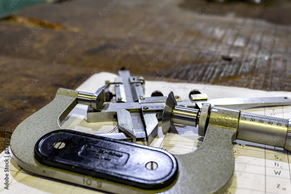 Measurer and vernier caliper for measuring the depth and thickness of the cut gear tooth on the gear cutter. Measurer and vernier caliper for measuring the depth and thickness of the cut gear tooth on the gear cutter.