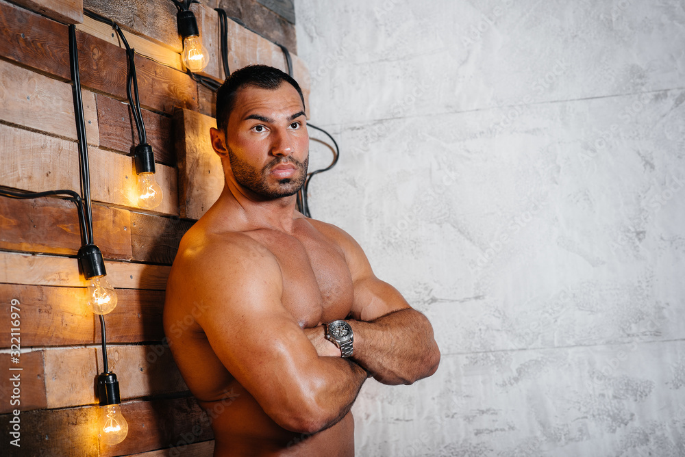 Sexy athlete posing topless in the studio. Fitness. Press. Sport Stock