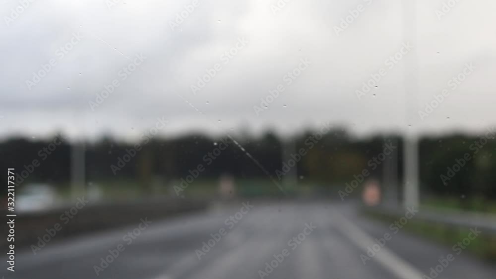 driving car on the road in rain driving car on the road in rain