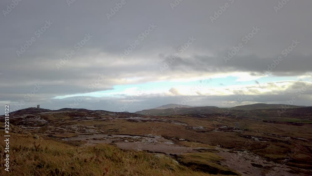 Scenic Northern Ireland rural mountain vast landscape time lapse. Clouds passing above hillside wilderness. Scenic Northern Ireland rural mountain vast landscape time lapse. Clouds passing above hillside wilderness.