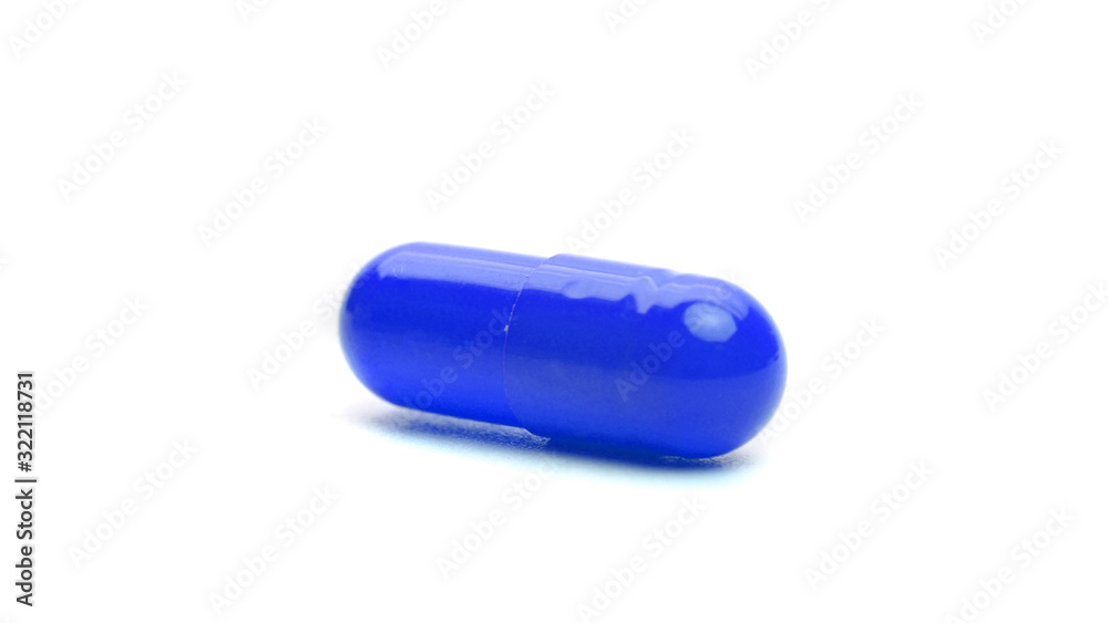 blue capsule isolated on a white background. medical capsule