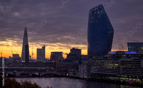 Epic dawn sunrise landscape cityscape over London city sykline looking East along River Thames © veneratio