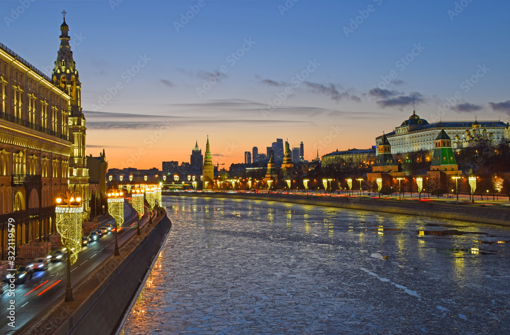 Fototapeta premium Evening shooting in Moscow near the Cathedral of Christ the Saviour and the Kremlin. Russia, Moscow, January 2020.