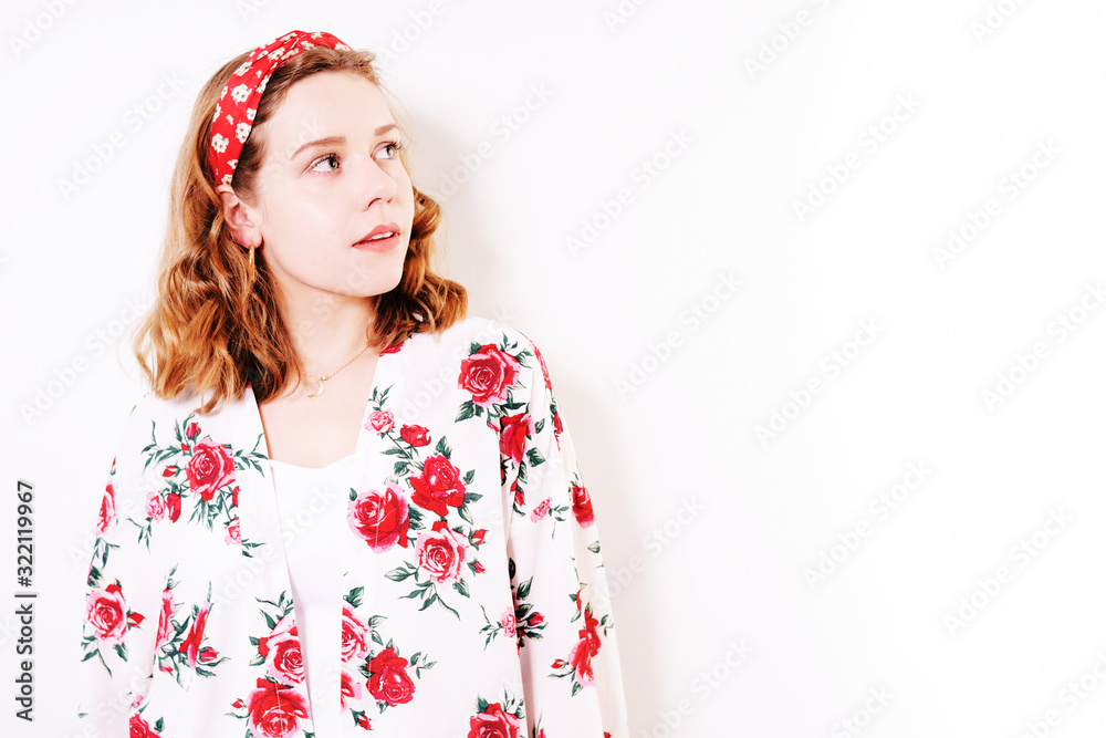 Incredibly cute teen girl smiles and looks away. A beautiful headband, a girl with short hair, a brown-haired woman, a blonde, a place for text Incredibly cute teen girl smiles and looks away. A beautiful headband, a girl with short hair, a brown-haired woman, a blonde, a place for text
