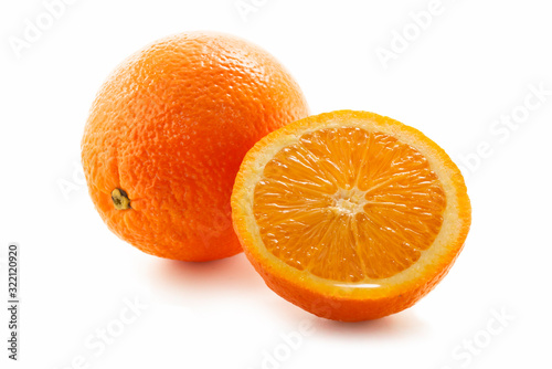 Ripe oranges isolated against white background