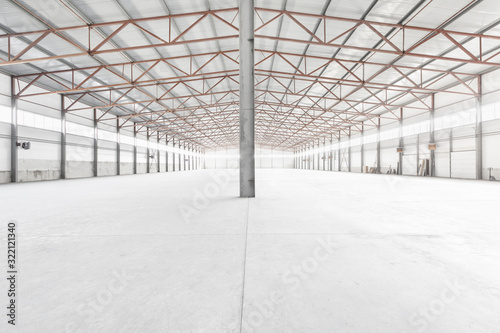 Interior of empty warehouse or garage in white colors