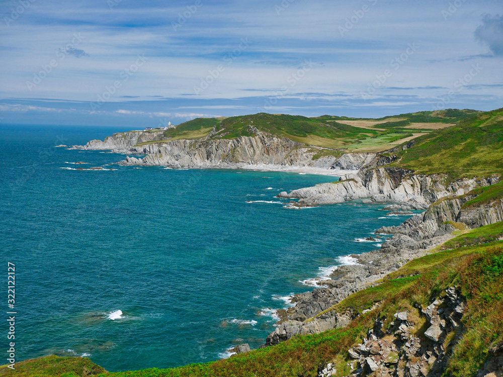 The north Devon coast around Bull Point showing steeply inclined slate strata of the Morte Slates Formation - sedimentary bedrock formed in the Devonian Period. Taken from the South West coast path.