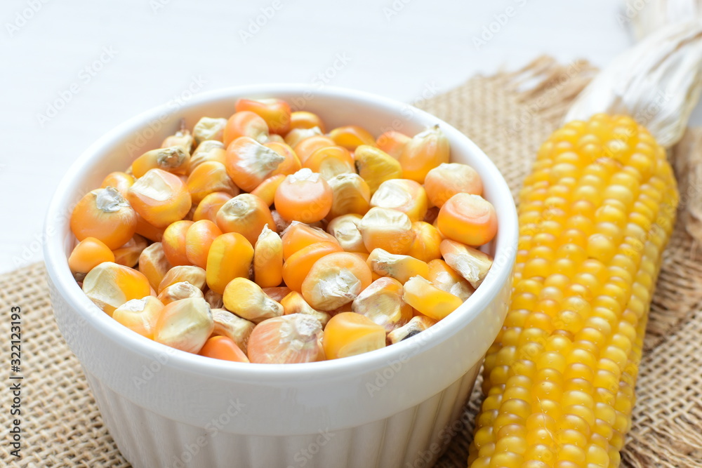 grains of natural corn in containers grains of natural corn in containers