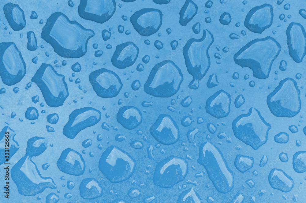 drops of water on a blue surface drops of water on a blue surface