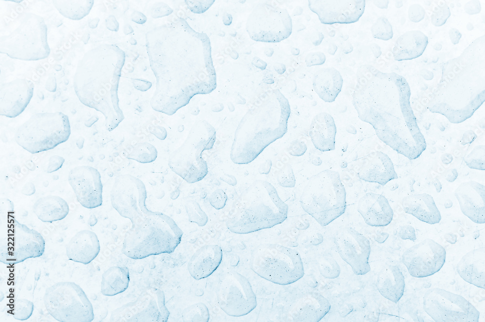 drops of water on a blue surface drops of water on a blue surface