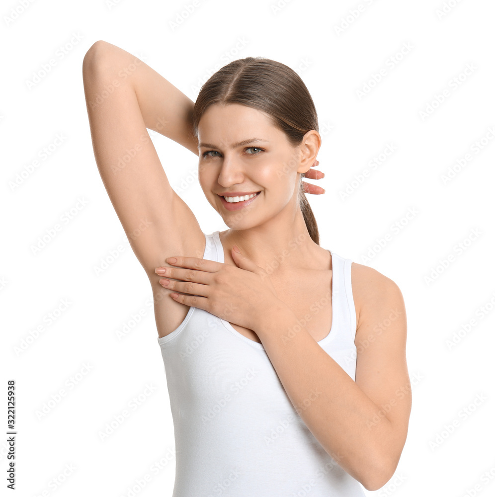 Young beautiful woman showing armpit with smooth clean skin on white background Young beautiful woman showing armpit with smooth clean skin on white background