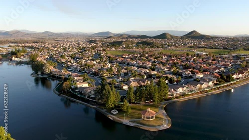 Aerial view of Menifee Lake and neighborhood, residential subdivision vila during sunset. Riverside County, California, United States